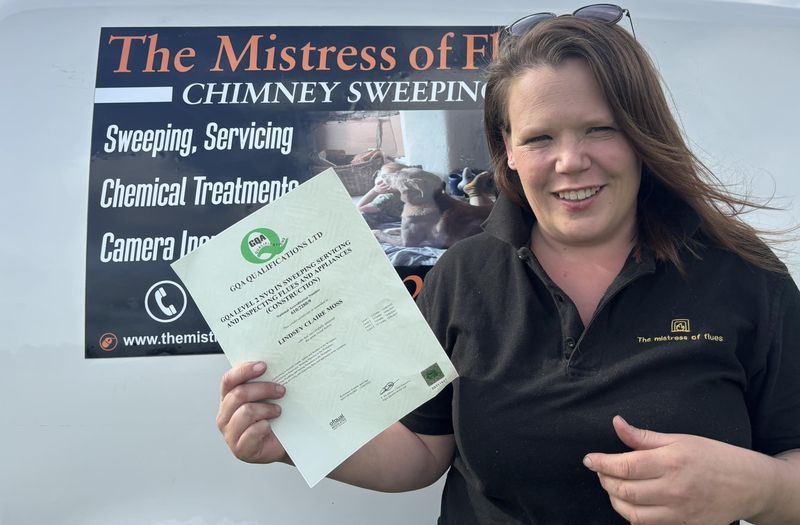 Lindsey Moss on a recent chimney sweep job